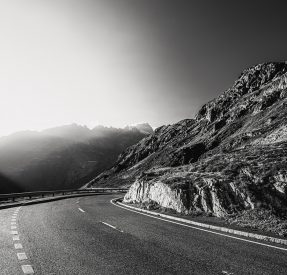 Bild In balance, a mountain pass road in the swiss alps