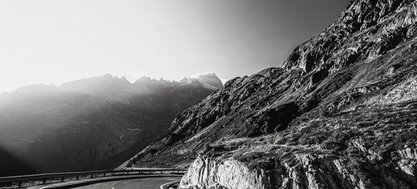 Bild In balance, a mountain pass road in the swiss alps